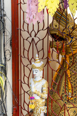 Naga and statue at the entrance to Wat Saen Fang in Chiang Mai