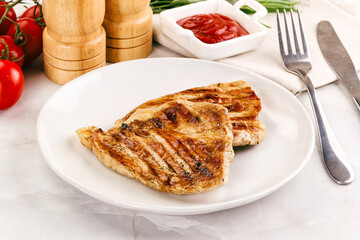 Grilled pork steak with sauce