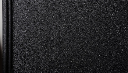 Fototapeta premium close-up of a black background with sandpaper texture
