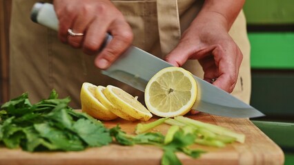 Slicing Lemons For Fish Barbecue
