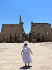 Girl looking at the Luxor Temple