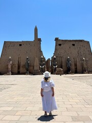 Girl looking at the Luxor Temple