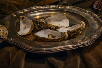metal plate with oyster shells