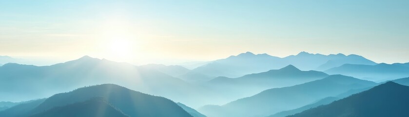 Naklejka premium Tranquil sunrise over misty mountain range, creating a serene and breathtaking natural landscape. Ideal for nature, travel, and scenic themes.
