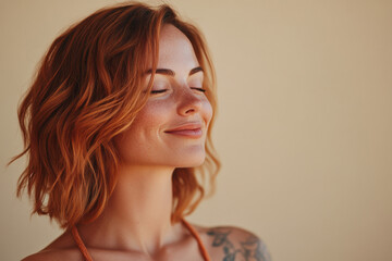 Naklejka premium A close up of a woman's face with tattoos and her eyes closed
