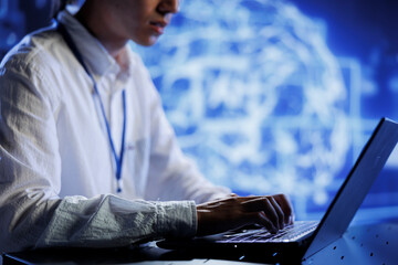 Computer scientist in data center uses artificial intelligence computing simulating human brain...
