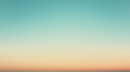 Fototapeta premium Turquoise blue sky softly fading into warm orange and yellow color at the horizon. Perfect background for summer and travel designs