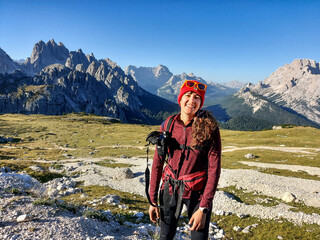 Photographer ready to hike in the Dolomites, Italy