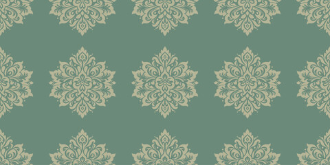 Elegant green damask pattern with intricate floral designs, perfect for vintage-inspired decor and textiles.