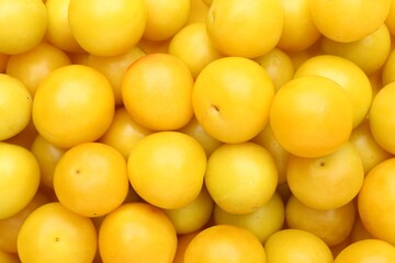 Many fresh plums as background, top view