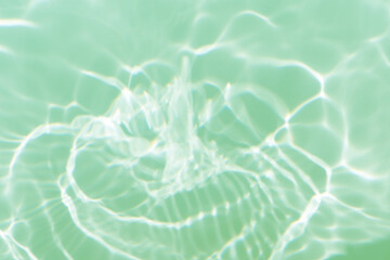 Blue water with ripples on the surface. Defocus blurred transparent blue colored clear calm water...