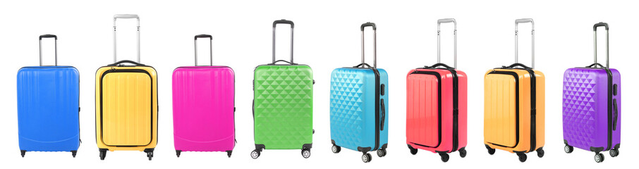Stylish suitcases of different colors on white background, set