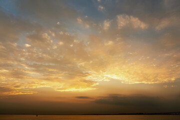 Tranquil Sunset Over the Lake with Dreamy Skies