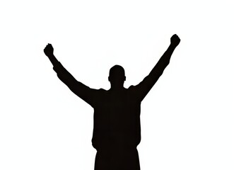 Silhouette of a man celebrating victory with arms raised high.