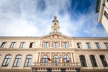 The main facade of Rigas Dome, Riga City Hall, or riga city council is shown in its full classical architectural glory. The building, located in the heart of Riga, serves as a central governmental hub