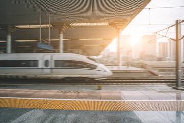 High-Speed Train in Motion at Modern Urban Station