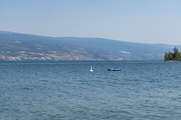 summer time July Okanagan Lake British Columbia Canada water landscape blue sky