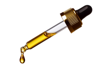 Cosmetic pipette with drops of cosmetic oil close-up isolated on a transparent or white background