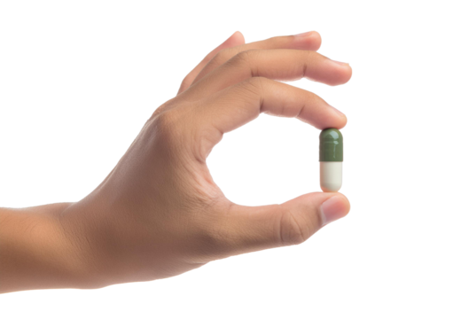 Hand holding capsule isolated on a transparent or white background