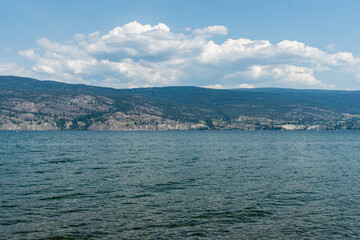 Fototapeta premium summer time July Okanagan Lake British Columbia Canada water landscape sky with clouds