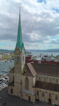 Zurich Switzerland Clock tower drone aerial orbit sunny day Vertical