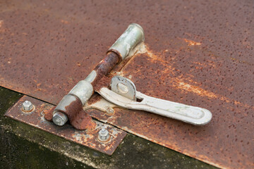 Close up of metallic door latches, Old and rusted door bolts.