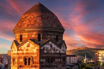 The Emir Saltuk Tomb and Aziziye Bastion in Erzurum during sunset, symbolizing historical heritage,...