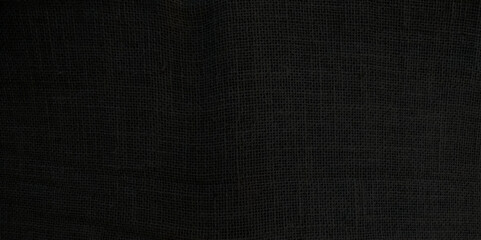 Black Sackcloth or burlap texture. Closeup of natural sackcloth, canvas, fabric, jute, pattern for background