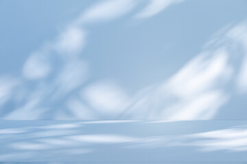 Fototapeta premium Wall interior background, studio and backdrops show products.with shadow from window color white and blue. background for text insertion and presentation product