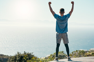 Back, fitness or man on mountain for success, achievement or arms up at ocean mockup. Victory, athlete or celebrate in nature space for wellness, winner or exercise goal with horizon view for freedom