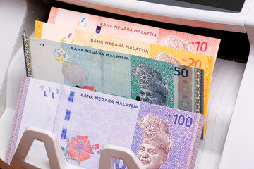 Malaysian ringgit in the counting machine