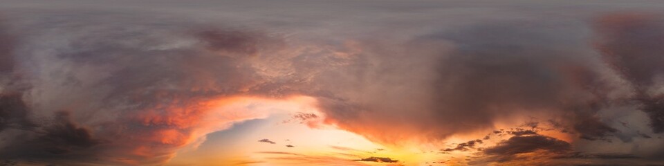 Golden glowing red orange overcast sunset sky 360 hdr panorama. Seamless spherical equirectangular panorama. Sky dome or zenith for 3D visualization and sky replacement for aerial drone 360 panoramas