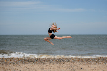 Dancer on beach