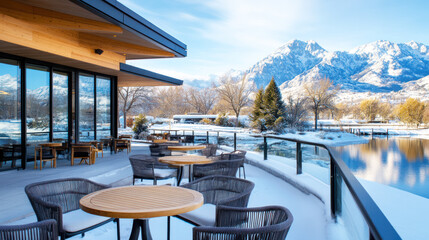A house with outdoor seating areas by snowy mountain, nature architecture