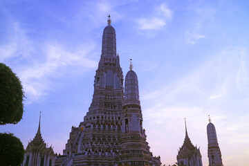 Stunning View of  Wat Arun Central Prang and Satellite Prang against Twilight Sky, Bangkok, Thailand