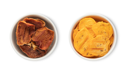 Bowl plates with dried healthy organic persimmon kaki pieces isolated on white background.Top view.