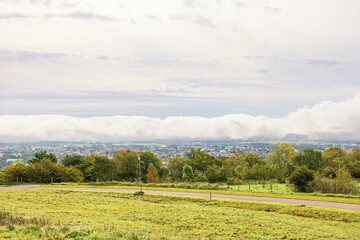 Fototapeta premium Clouds with rain weather on the way in the landscape