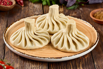 Authentic Georgian Khinkali Dumplings on Rustic Plate