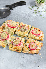 Pear and Gorgonzola Flatbread Pizza with Blue Cheese and Pear Toppings on Stone Background
