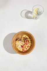 Vibrant Mango Smoothie Bowl with Wild Rice, Coconut, and Raspberries