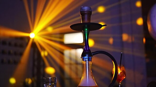 Hookah on a table in a nightclub or cafe. 