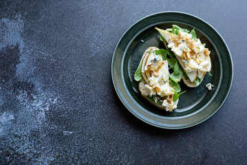 Bruschetta set on dark background, close up, place for text