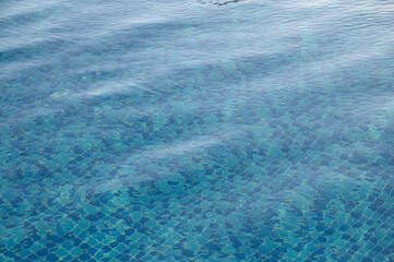 Overhead view of blue water surface abstract in a pool