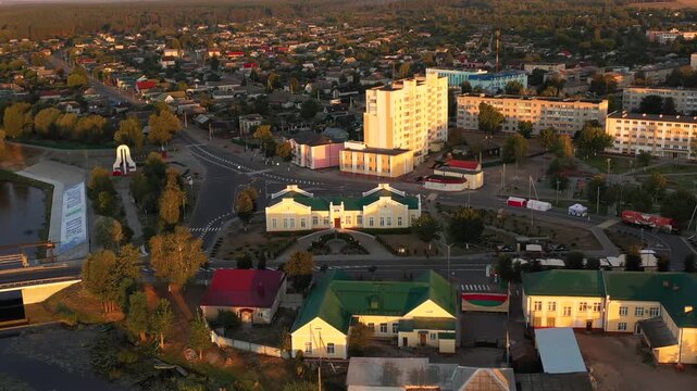 An Enchanting Aerial View Showcasing a Serene Township Captured at Dusk During a Beautiful Sunset. Belarus, Dobrush city