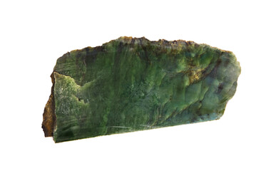 A natural mineral made of jade on a white background. A sample of green stone