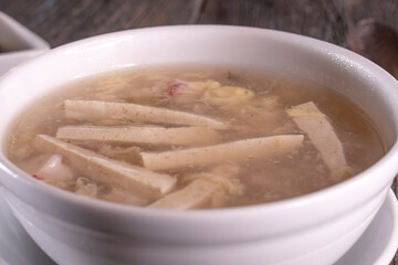 Chinese Tofu Vegetable Soup on wood table. Chinese food.