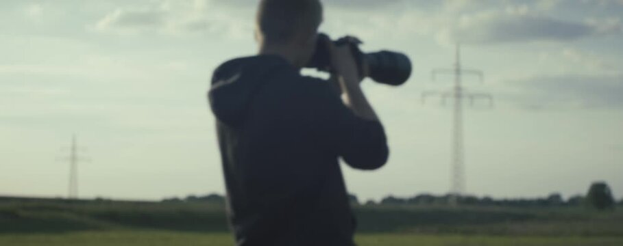 Fotograf mit Tele objektiv