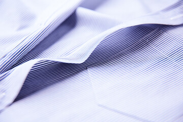 Close up of mens striped shirt.