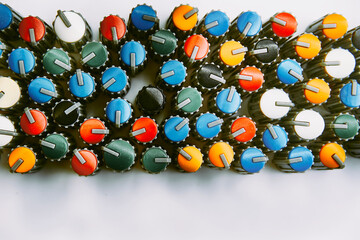 Multi colored buttons knobs potentiometers for volume, frequencies. mixer