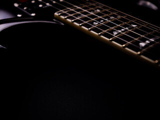 Fototapeta premium Fretboard of modern electric guitar. Close up.